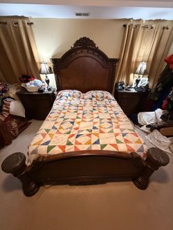 Queen sized ornate wooden bed frame