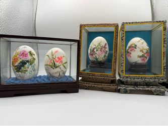 Hand painted eggs w/display cases