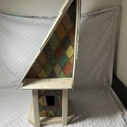 Bird house? 20 and a half inches tall