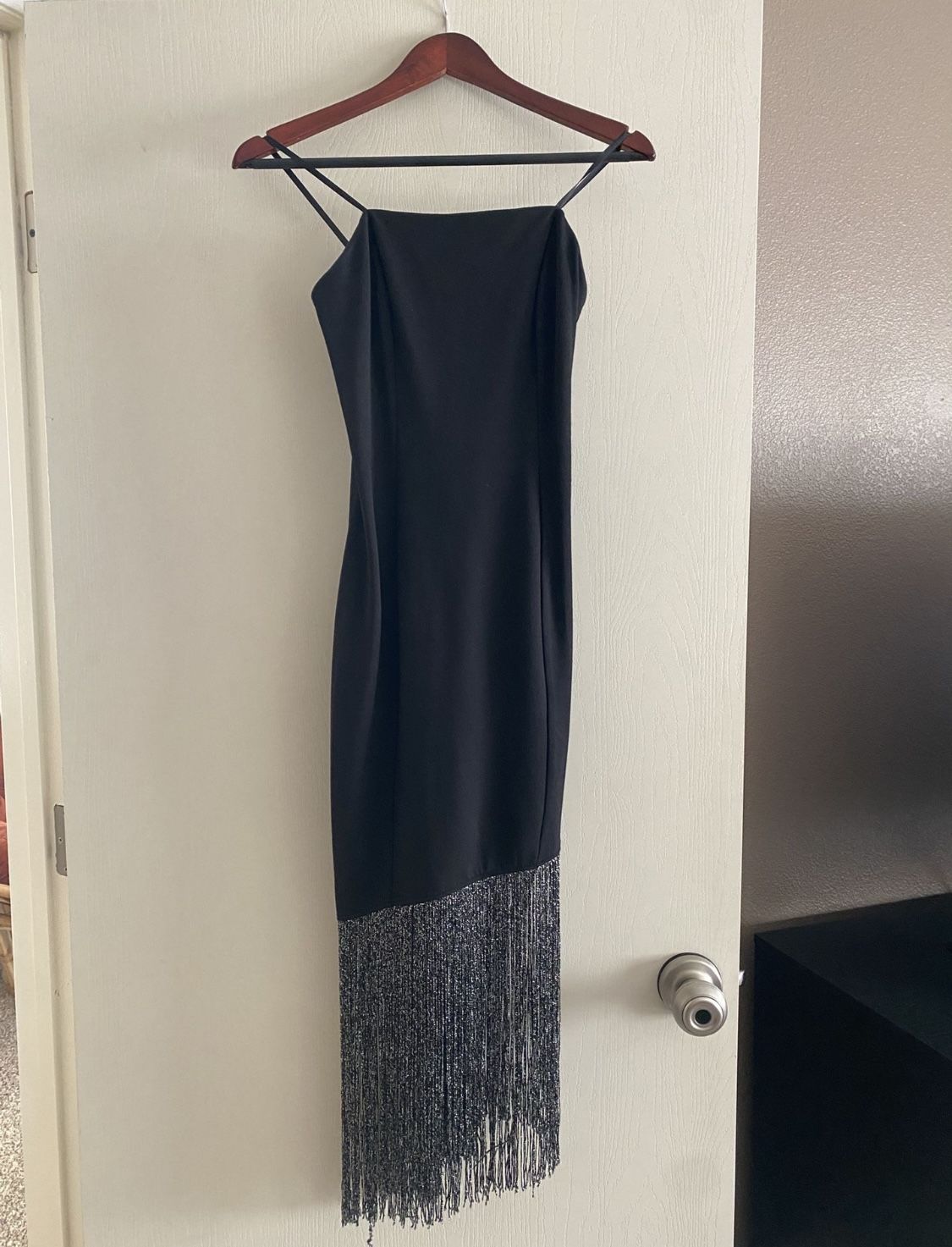 Elegant Black Dress with Silver Tassels