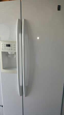 Ge white side by side refrigerator