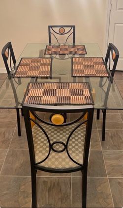 Glass dining table with 4 chairs