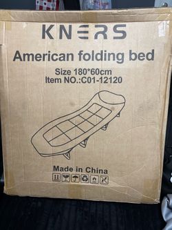 Folding cot/bed