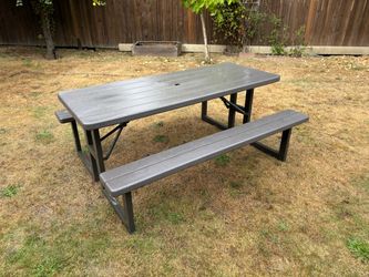 Outdoor Picnic Table with Attached Benches, and two additional grey metal outdoor dining chairs