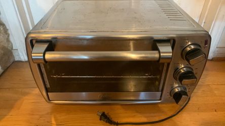 Oster TSSTTVCG04 6-Slice Convection Countertop Oven - Silver color