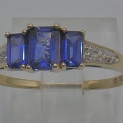 10KT YELLOW GOLD RING 2.1 GRAMS ; SIZE 9.75 WITH BLUE STONES MINT CONDITION. 866778-2