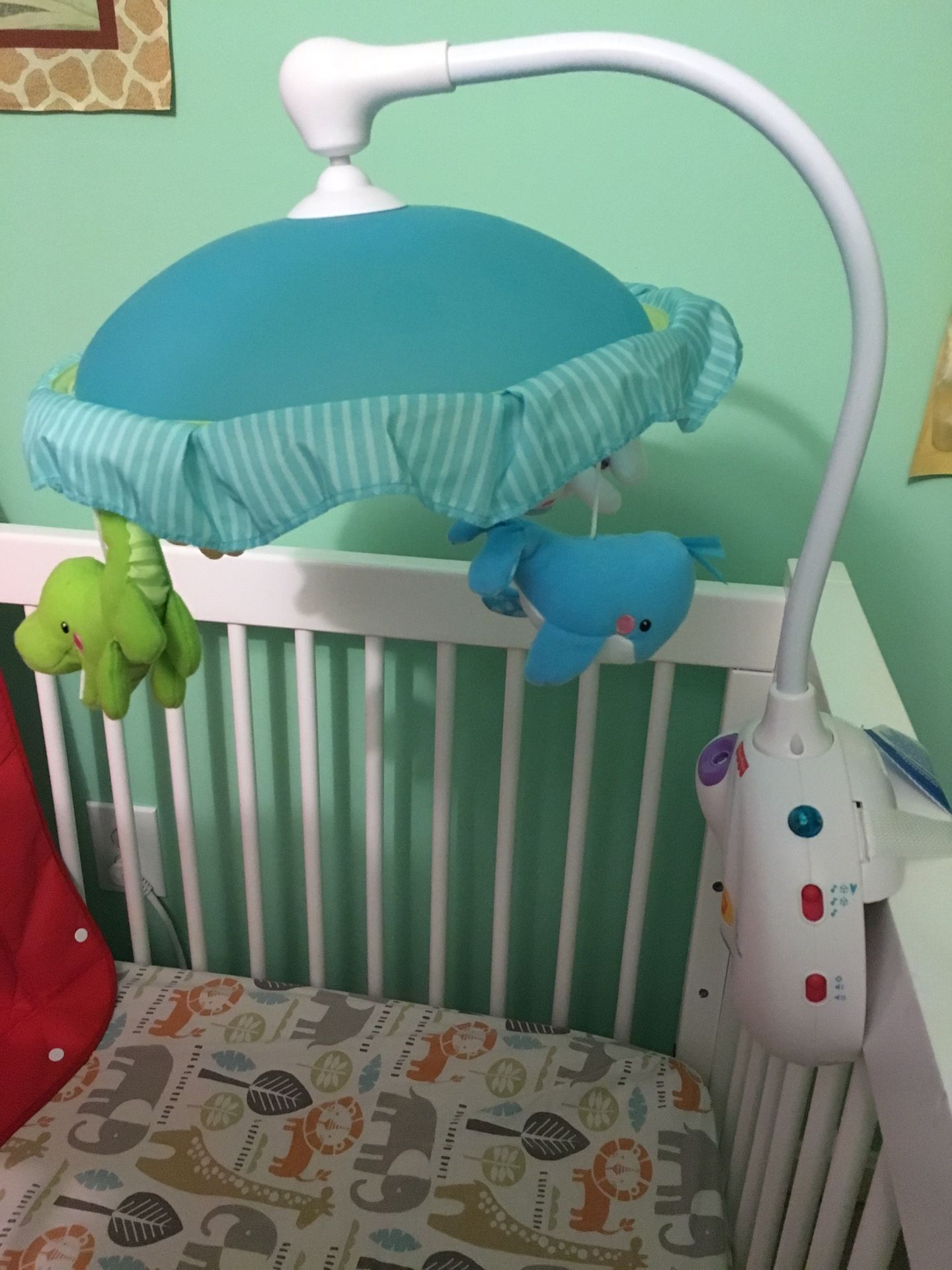 Crib mobile with music and lights - gently used!
