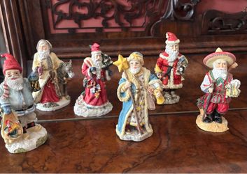 Set of six adorable small vintage Santa figures