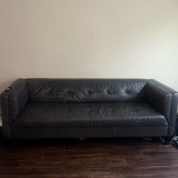 Grey Leather couch 