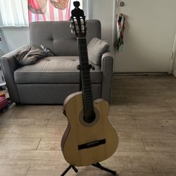 Acoustic Guitar + stand + yamaha guitar bag + electric tuner 