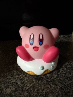 Kirby on a donut from nintendo