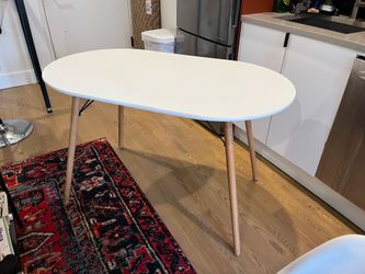 White Oval Dining Table with Wood Legs