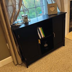 Black Cabinet with Golden Accent Handles