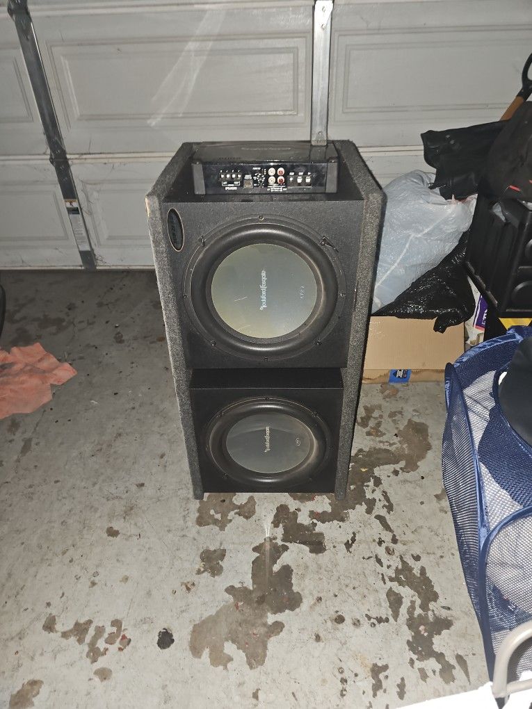 Rocksford fosgate 2 P2 12"subs in box with power series punch p400-2 amplifier