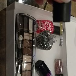 Brand new eyeshadow and lip gloss and nail polish in a kit never used brand new