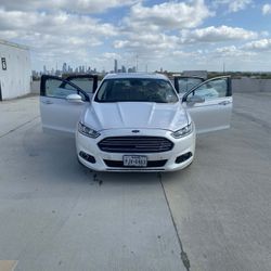 2015 Ford Fusion · Hybrid Sedan 4D