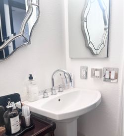 White Ceramic Pedestal Sink with Chrome Faucet