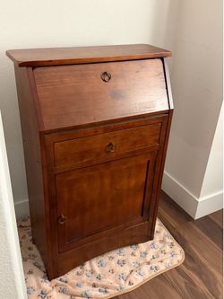 Wood storage cabinet