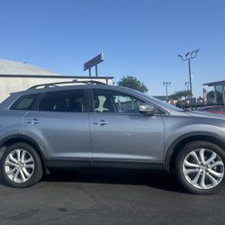 2012 MAZDA TOURING $6.500