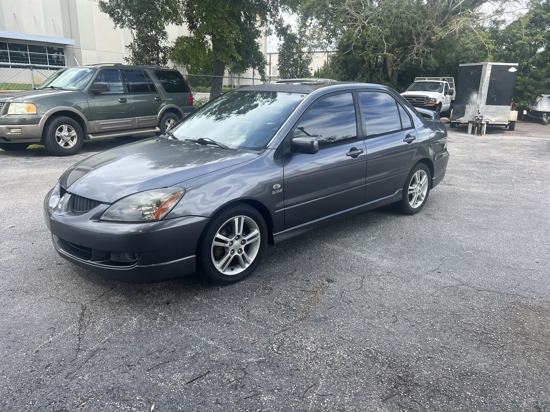 2004 MITSUBISHI LANCER. $2,675