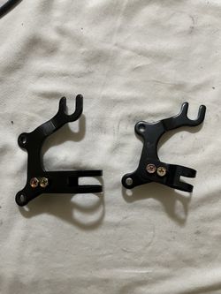 Adapters to add disc brakes to bicycle