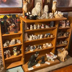Cat collectible figurines, various prices. Inquire if interested.