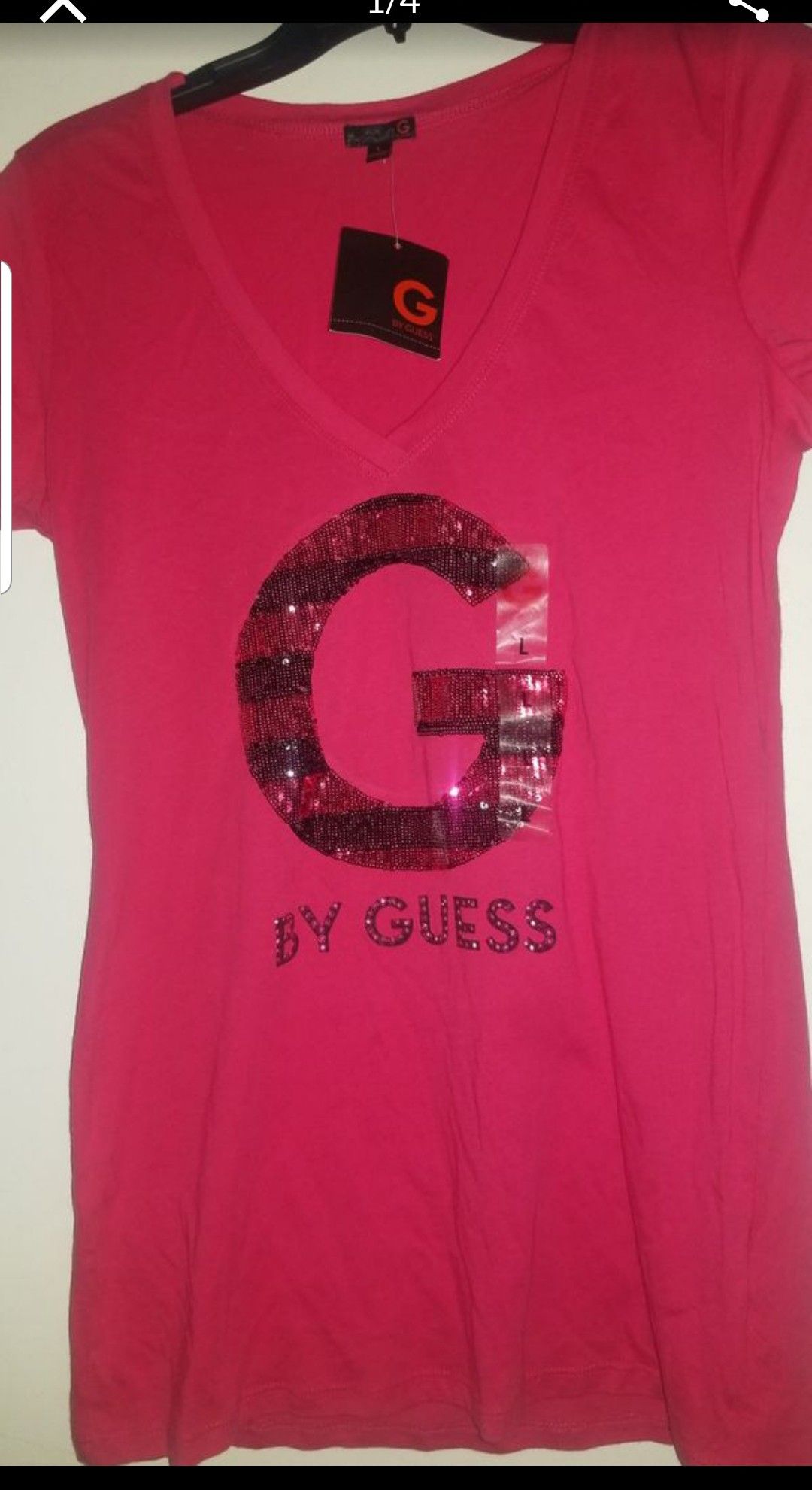 Guess shirt size large in juniors tag still on it