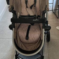 evenflo pivot travel system