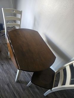 Round table with two chairs