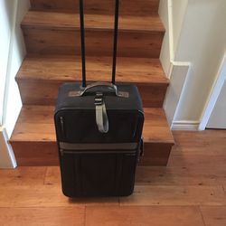 Carry On Suitcase  The Dimensions are ;24”H X 14” W x7,5”D   (78759 Nw Austin)