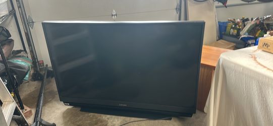 Free 55” Mitsubishi tv and stand