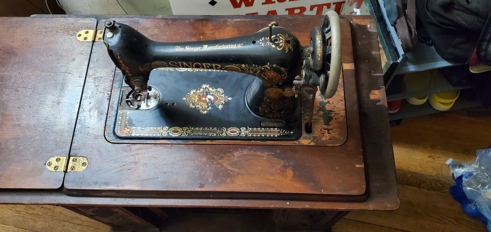 vintage singer mechanical machine.