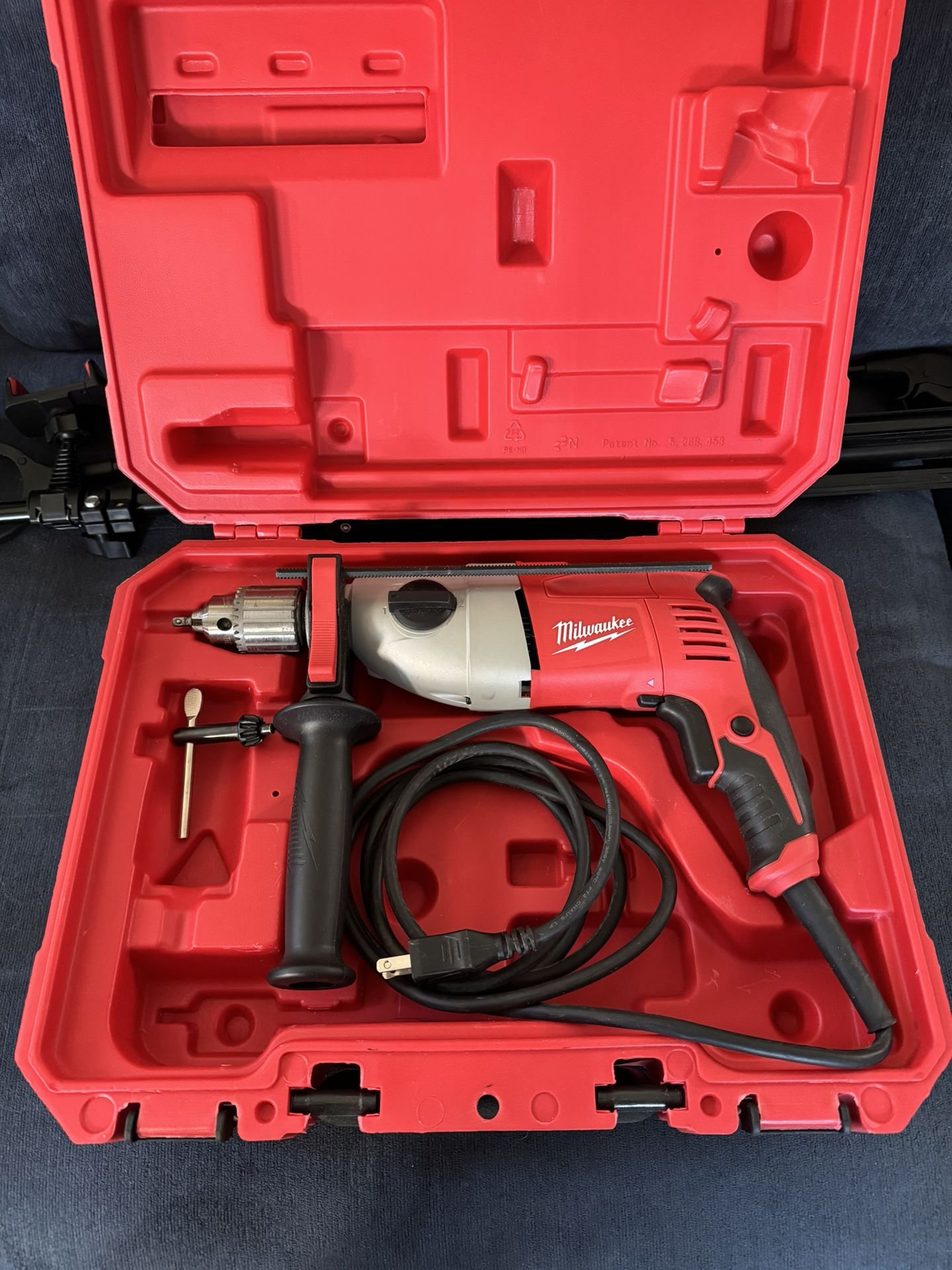 Milwaukee 5380-21 1/2-inch Heavy-Duty Hammer Drill with its carrying case