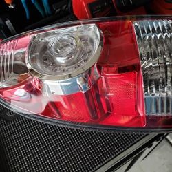 Toyota tacoma tali light driver side . New