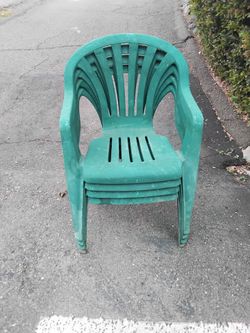 4 plastic Stackable chairs.  Clearance all for