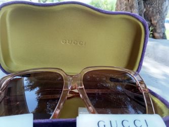 Authentic  Gucci GG1314S, oversized square sunglasses.  Transparent, pink/ beige