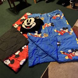 $40-Mickey mouse bedroom stuff- 2 twin blankets 1 giant black mickey mouse  pillow. altogether as they set- changing my son’s bedroom to a big boy roo