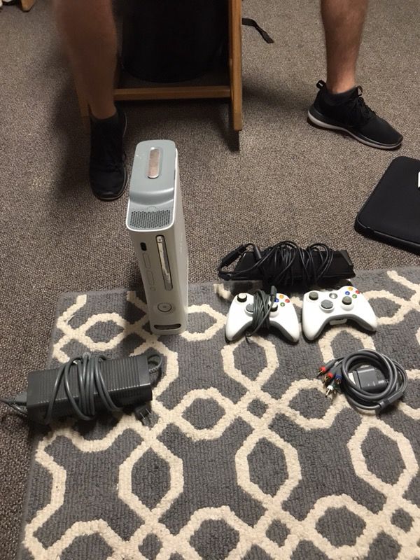 Xbox 360 with Kinect, 15 games, and 2 controllers