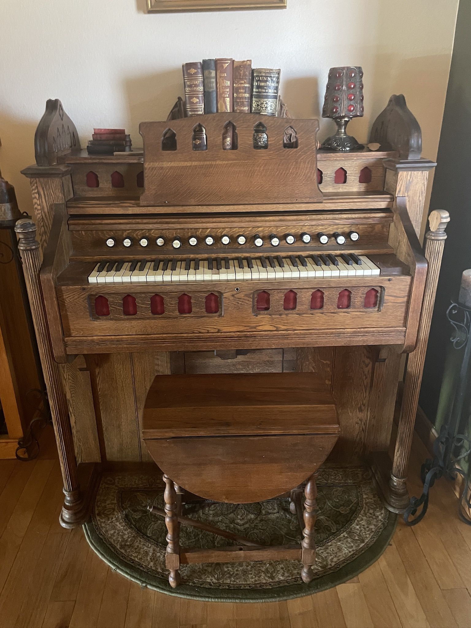 antique reed organ, a pump organ, parlor organ