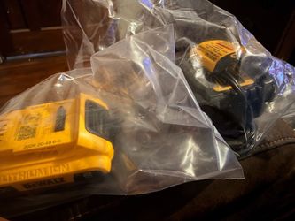 NEW DEWALT BATTERY ANDCHARGER