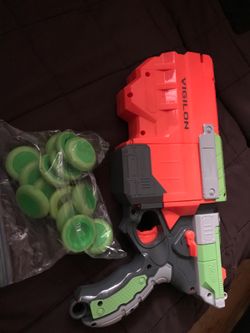 Nerf Vigilon blaster toy with bag of Nerf discs