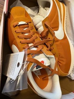 Nike Cortez Orange Low-Top Sneakers