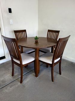 Table & 4 Chairs Good Condition