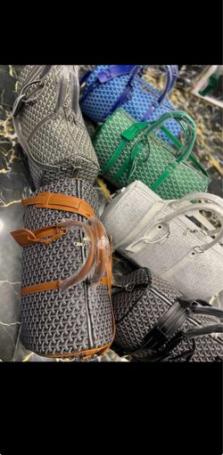 Goyard duffle bags