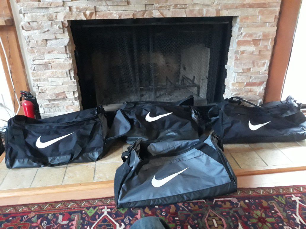 2 Nike sport duffle bags left