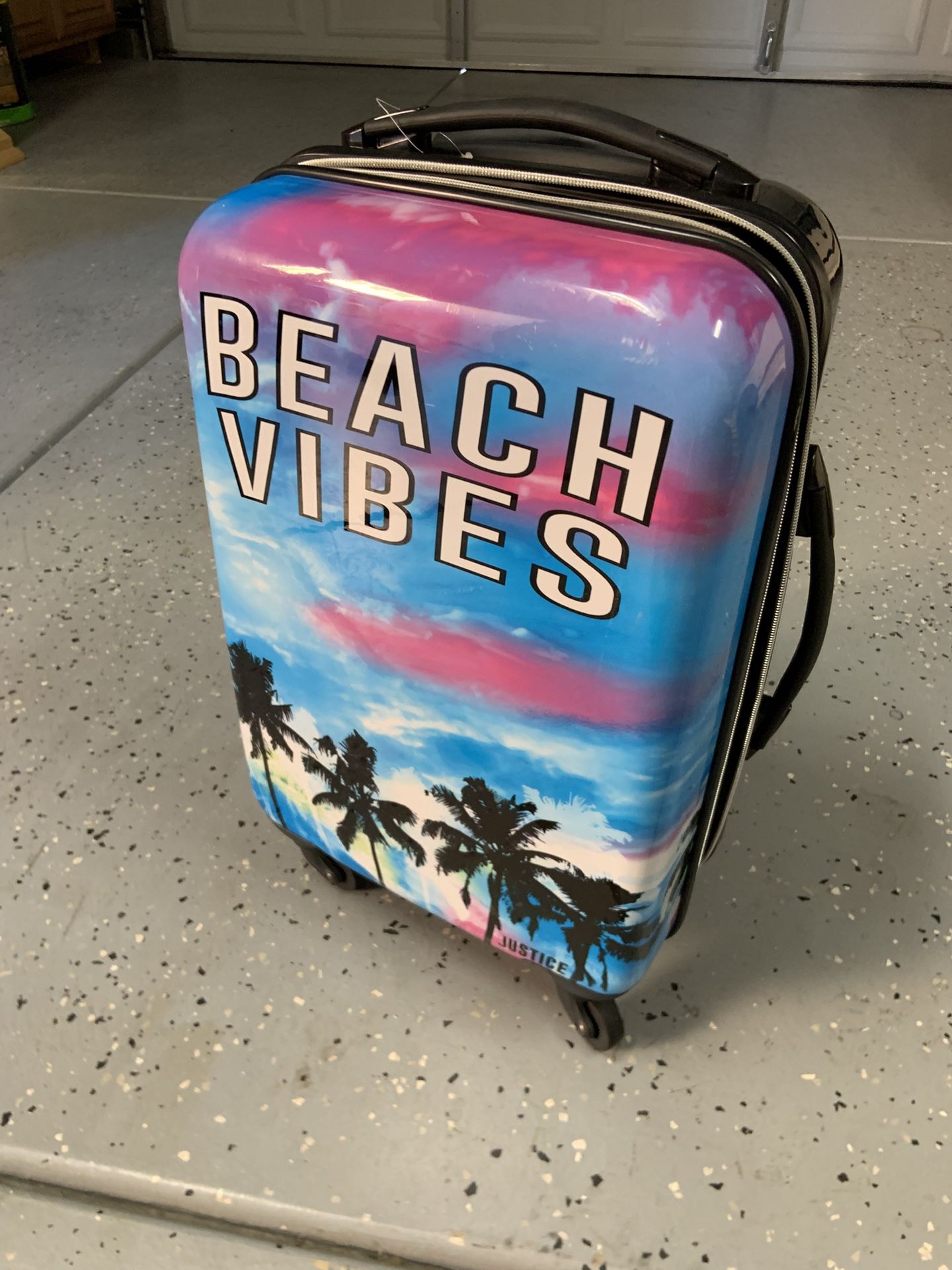 Justice Kids hard shell luggage