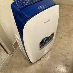 Portable Air Conditioner/ Dehumidifier 
