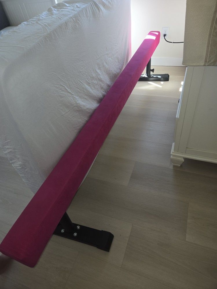 Adjustable gymnastics beam