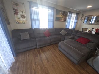 Large Gray Sectional Recliner Sofa and fireplace TV stand  for sale 2,000 or best offer