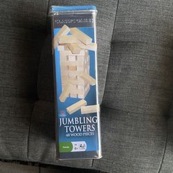 Cardinal Classic Games Jumbling Towers game in a tin package.